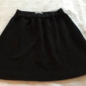 Mid length black skirt